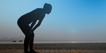 Image of a woman resting from a run.